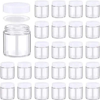 Hvide kosmetiske krukker